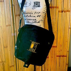 Elton John x Aida computer messenger bag